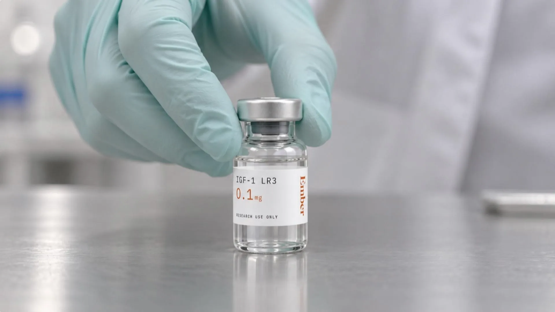 An Ember Peptides IGF-1 LR3 research vial on a laboratory bench